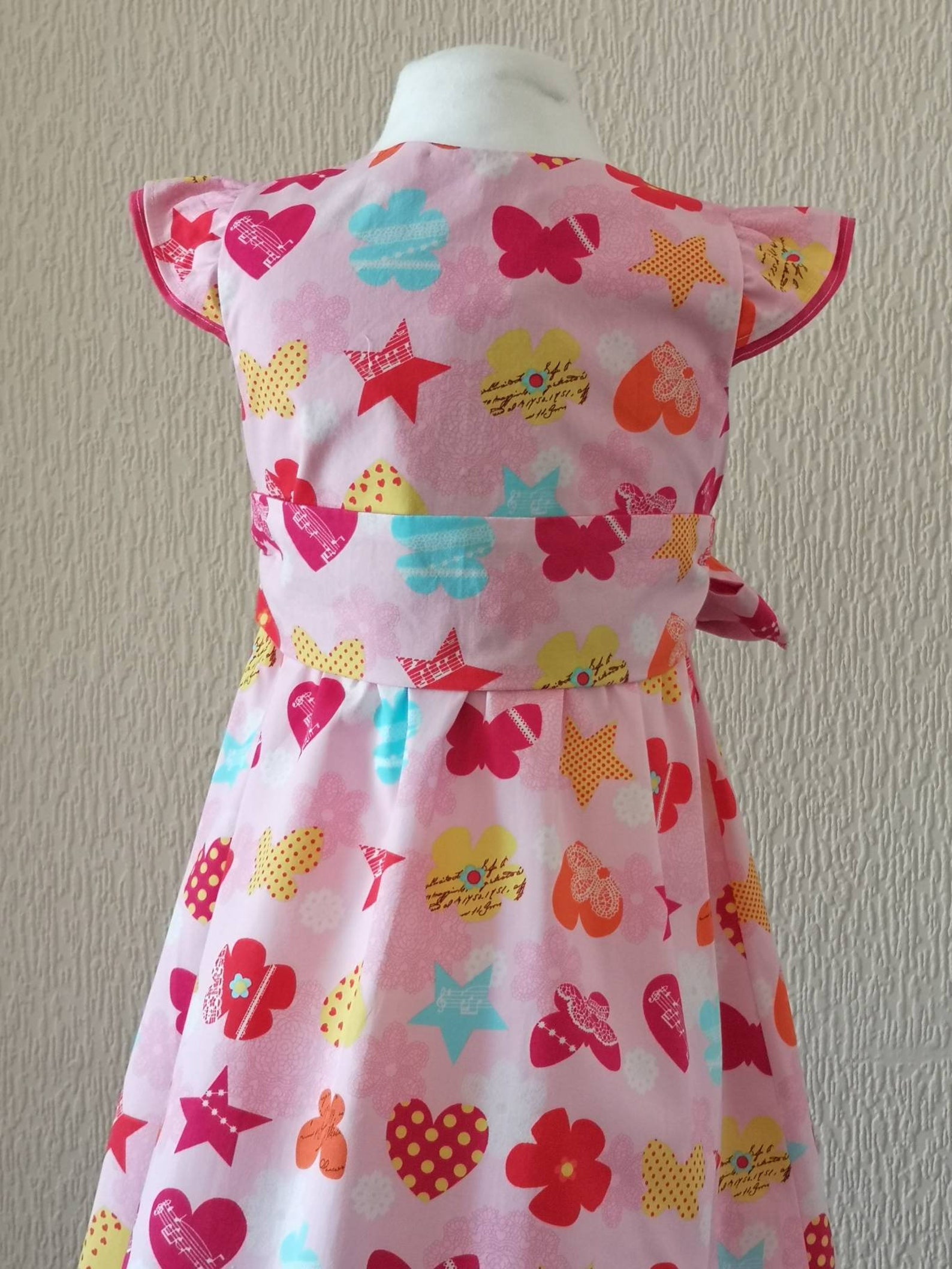 Child's Crossover dress in cotton fabric in pink with | Etsy
