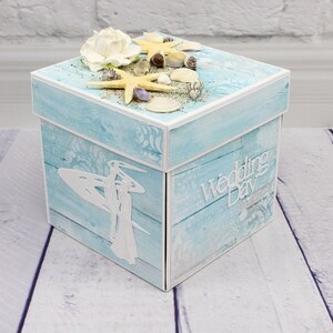 Caja de regalo explosiva para boda en la playa: estrellas de mar, conchas y recuerdos