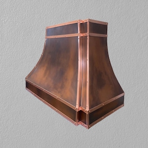 Handcrafted Copper Range Hood with Smooth Curves and Riveted Accents – Custom Kitchen Vent Hood