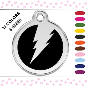 May include: Silver pet tag with a black circle and a white lightning bolt design. The tag is available in 11 colors and 3 sizes.