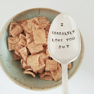 A vintage silver plated spoon with the words ' I CEREALSLY LOVE YOU' engraved on them.