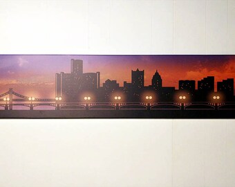 May include: A black silhouette of a city skyline with a bridge in the foreground. The sky is a gradient of purple, orange, and red, suggesting a sunset.