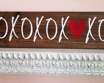 XOXOXO sign on wood, 35 1/2" x 7 1/2" x 3/4"