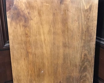 16" x 32" cutting board with a handle.