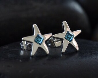 Star stud earrings with blue coloured Swarovski crystals