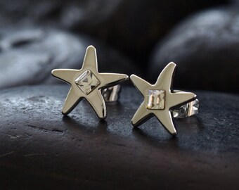 Star stud earrings with clear coloured Swarovski crystals