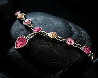 Sweet Hearts  bracelet with rose coloured Swarovski crystals finished in a rhodium setting.