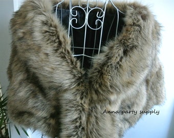 May include: A brown faux fur shawl with a V-neckline. The shawl is displayed on a black mannequin. The text "Anna party supply" is visible in the bottom right corner of the image.
