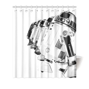 May include: A black and white image of a line of R2-D2 robots. The robots are all facing the same direction and are lined up in a row. The robots are all in focus and the background is blurred.