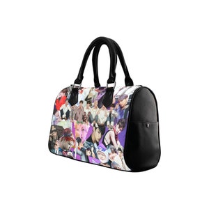 May include: A black leather handbag with a collage of colorful images on the front. The images are of people, mostly men, with a purple background.
