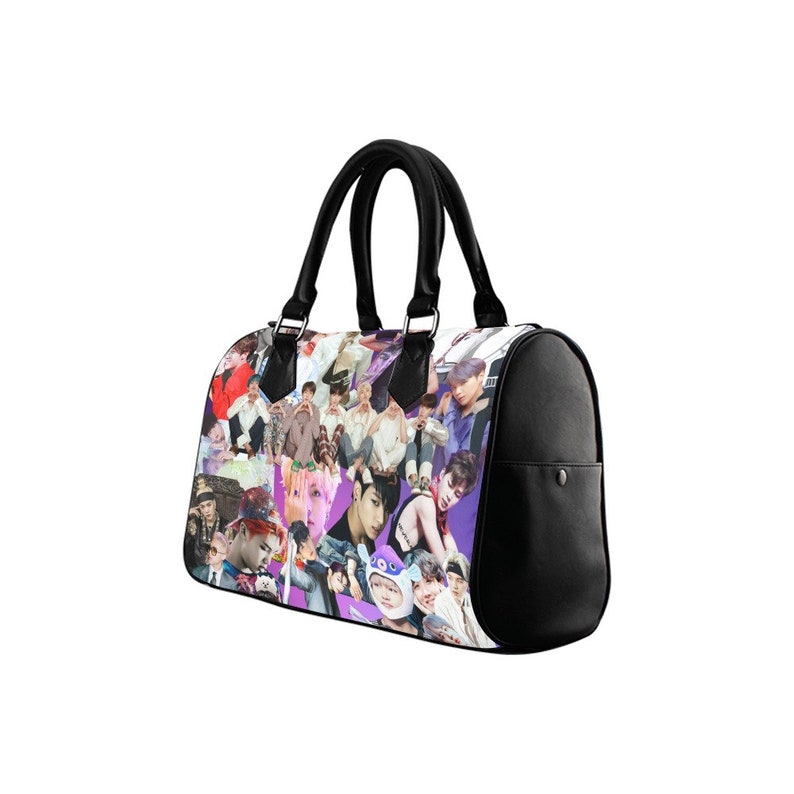 May include: A black leather handbag with a collage of colorful images on the front. The images are of people, mostly men, with a purple background.