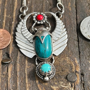 handmade sterling silver and natural turquoise with natural red coral scarab necklace.