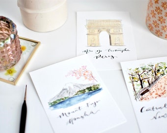 Location wedding table name cards // hand painted bespoke wedding table cards, alternative table numbers, location, travel themed signs
