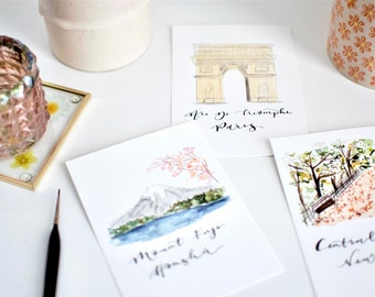 Location wedding table name cards // hand painted bespoke wedding table cards, alternative table numbers, location, travel themed