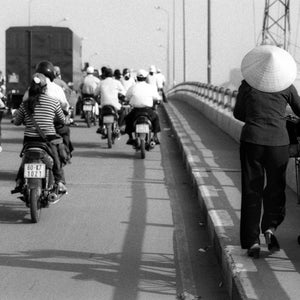 Rush-Hour Radfahrer, Saigon, Vietnam.