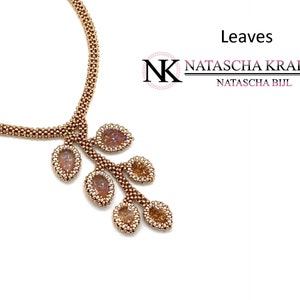 May include: A beaded necklace with a leaf pendant. The necklace is a golden brown color, with a beaded chain and a leaf-shaped pendant. The pendant has a cluster of leaves with a light brown color. The word "Leaves" is in the image.
