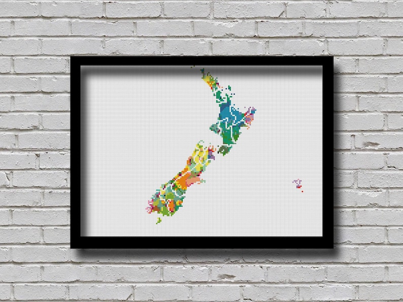 May include: A colorful cross-stitch pattern of the outline of New Zealand. The map is stitched in a variety of colors, including green, blue, yellow, and orange.
