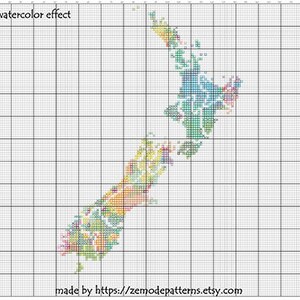 May include: A watercolor effect cross stitch pattern of New Zealand. The pattern is on a white grid with colorful squares representing the different regions of the country. The text "map watercolor effect" is at the top of the image and "made by https://zemodepatterns.etsy.com" is at the bottom.