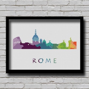 May include: A colorful pixelated skyline of Rome, Italy, with the word "ROME" printed below the skyline.