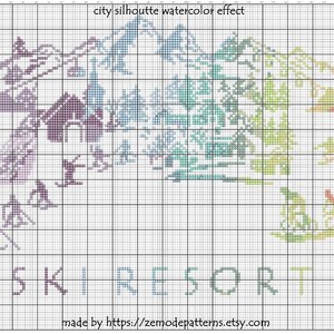 May include: Cross stitch pattern of a ski resort with a watercolor effect. The pattern features a city silhouette with mountains and trees in the background. The text "SKI RESORT" is stitched in the bottom center of the pattern.