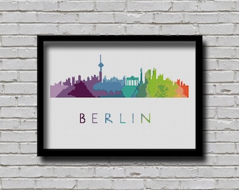 May include: A colorful pixel art cityscape of Berlin, Germany. The skyline is made up of various buildings, including the Brandenburg Gate and the Berlin TV Tower. The word "BERLIN" is written below the skyline.