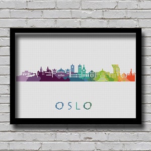 May include: A colourful pixelated skyline of Oslo, Norway, with the city name written below in blue.