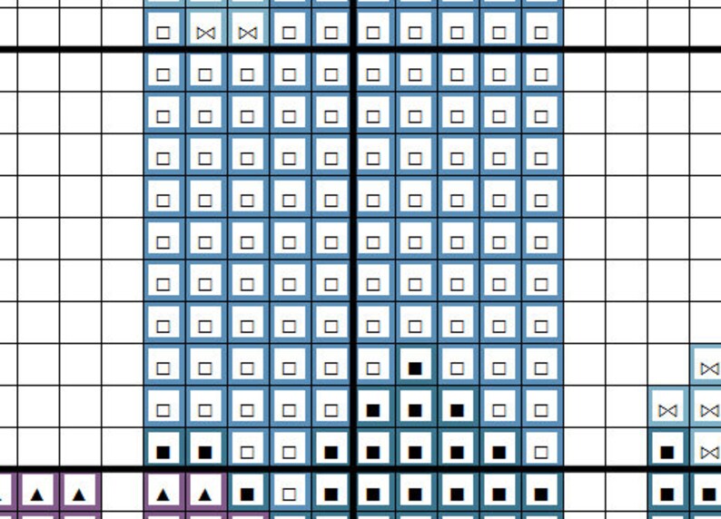 May include: A cross-stitch pattern chart with a grid of squares. The design features a central rectangular shape with blue and white squares, and black squares at the bottom. The chart includes symbols and color blocks.