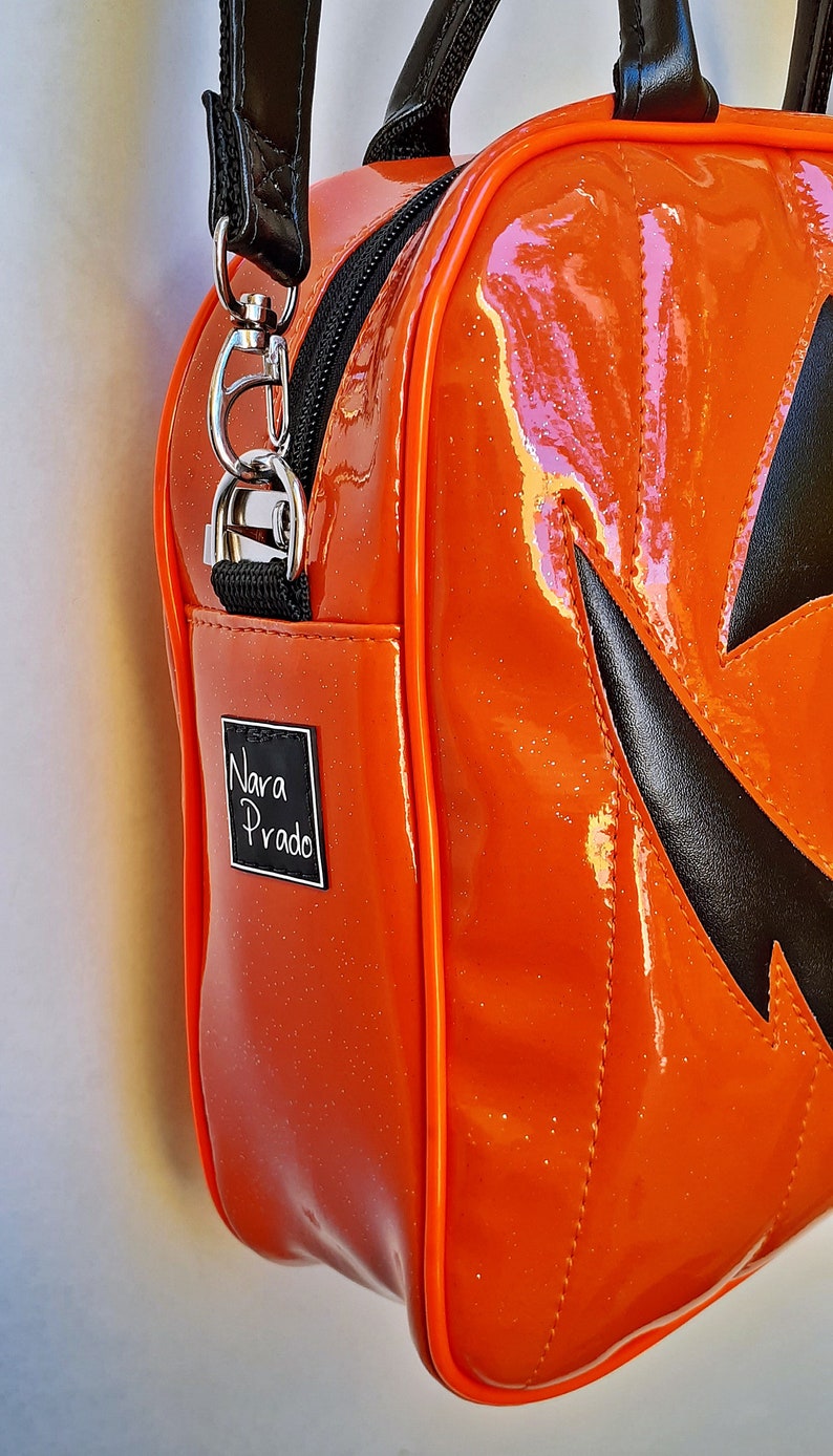 Nara Prado Pumpkin Glitter Suitcase