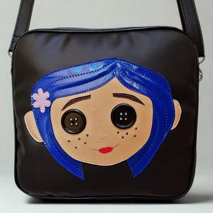 Coraline Handgefertigte quadratische Umhängetasche Nara Prado