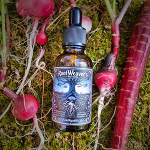 May include: A small brown glass bottle with a black dropper top and a label that reads "RootWeaver's Potion". The label features a stylized illustration of a tree with roots and the words "Andrographis root, Black root, Gingerroot, VioletApethetic, Licorice root, Ashwagandha root, Cinnamon, clove". The bottle is surrounded by red radishes and a red carrot.