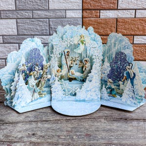 Carte pop-up 3D fabriquée à la main au pays des merveilles de l'hiver en papier Carte surprise Joyeux Noël Jésus-Christ Carte de remerciement d'anniversaire Un excellent cadeau