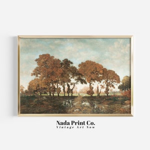 May include: A vintage painting of a landscape with a group of trees in the foreground. The trees are brown and orange, and the sky is a light blue. The painting is framed in a gold frame.