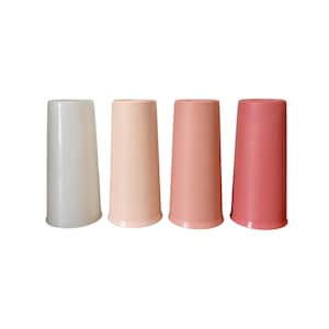 May include: Four cylindrical drinking cups arranged in a row, featuring a smooth finish and a tapered design. The colors transition from a pale off-white to a light peach, followed by a soft coral, and ending with a deeper, vibrant rose pink shade.