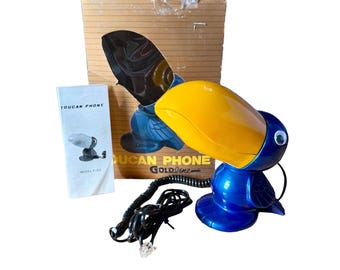 Teléfono antiguo con forma de tucán