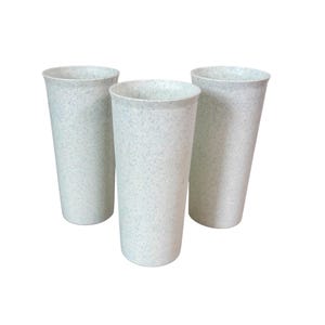 May include: Three tall, speckled white plastic tumblers. The cups have a cylindrical shape with a slightly flared top. The speckled pattern is a light blue color. The tumblers are empty and set against a white background.