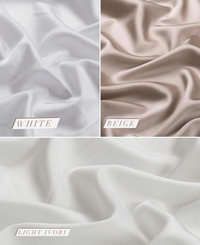 May include: Three swatches of fabric in different shades of white: white, beige, and light ivory. The fabric is smooth and silky.