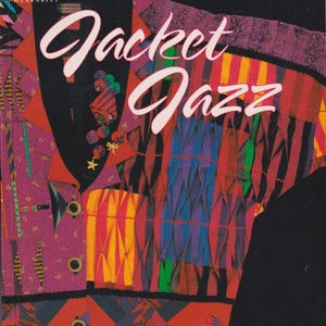 Puede incluir: Portada del libro "Jacket Jazz" con un diseño de chaqueta patchwork colorido. El texto de la portada incluye "Five Great Looks... Over 30 Patchwork Techniques" y "by Judy Murrah". La editorial es "That Patchwork Place".
