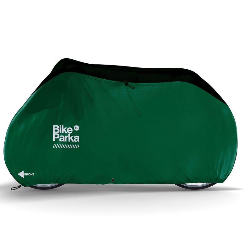 May include: A green Bike Parka XL bicycle cover. The cover is dark green with a black top and a zipper. The Bike Parka logo is in white on the side, with the word "FRONT" and an arrow pointing to the front of the cover.