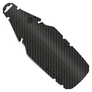 May include: A black carbon fiber bicycle mudguard with a textured weave pattern. The mudguard has a unique bottle shape with cutouts and the text "riesel design" and "nib-pe-l". The top has a hole for hanging.