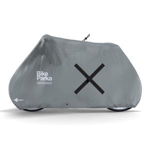 May include: A gray bike cover with the text "Bike Parka" and a large black X. The cover is draped over a bicycle, with the front of the cover indicated by an arrow. The cover is designed to protect the bike from the elements.