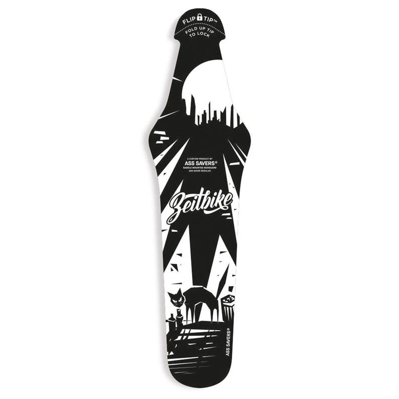 May include: Black and white Zeitbike saddle mounted mudguard. The design features a cityscape silhouette, a full moon, and a cat. The top reads "Flip Tip Fold Up Tip To Lock". The bottom reads "Ass Savers".