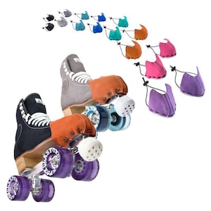 May include: Roller skates with black and gray boots, purple wheels, and wooden heels. Various colored toe guards, including black, gray, blue, teal, orange, pink, and purple, are displayed above the skates.