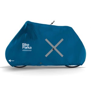 May include: A teal bicycle cover with the text "Bike Parka" and a white stripe design. The cover has a reflective X-shaped design and a drawstring closure. The word "FRONT" is visible on the cover.