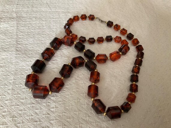 Long  translucent deep amber coloured cylindrical… - image 2