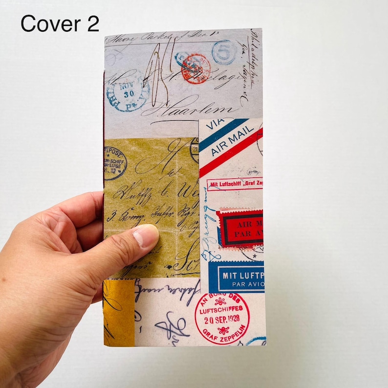 May include: A rectangular notebook cover featuring a vintage collage of postal elements, including handwritten script, circular postmarks, and air mail labels. The design incorporates text such as AIR MAIL, MIT LUFTSCHIFF, and GRAF ZEPPELIN in red, blue, and black ink.