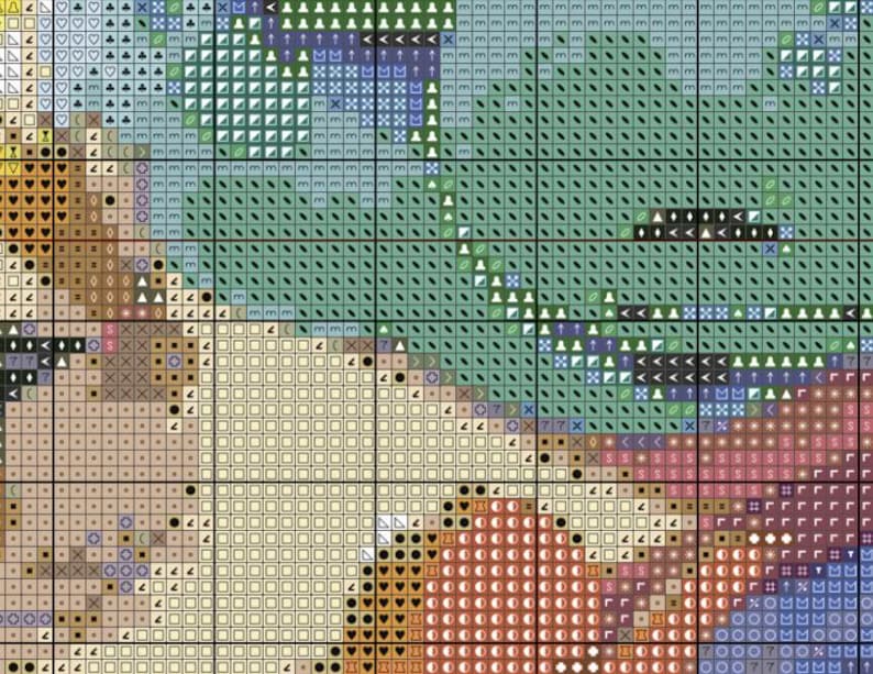 May include: A cross stitch pattern chart printed on a grid with black lines. The design features various colored squares containing symbols such as hearts, triangles, slashes, and letters, representing different thread colors for embroidery work.