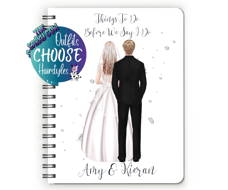 May include: A white spiral bound notebook with a white background and a couple in wedding attire. The text "Things To Do Before We Say I Do" is at the top of the page. The couple's names "Amy & Kieran" are at the bottom of the page.