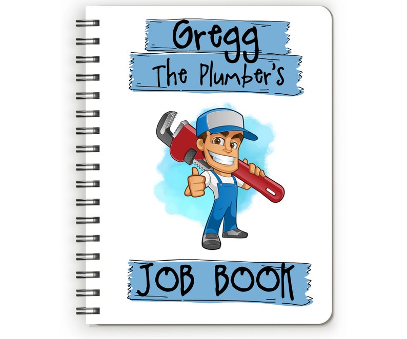 May include: Spiral-bound notebook with the text "Gregg The Plumber's JOB BOOK." The cover features a cartoon plumber in blue overalls and a cap, holding a red wrench and giving a thumbs-up.