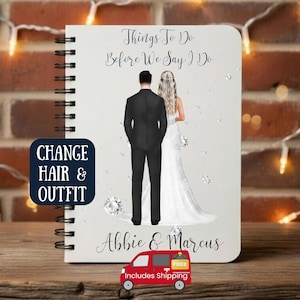 May include: A white spiral-bound notebook featuring a printed illustration of a couple standing back-to-back. The text reads "Things To Do Before We Say I Do" and "Abbie & Marcus". A dark blue square overlay displays the text "CHANGE HAIR & OUTFIT".