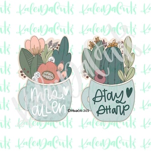 May include: Two blue ceramic mugs with floral and cactus designs. The mug on the left says "mrs. allen" and the mug on the right says "stay sharp".